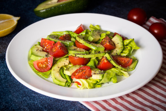 Avocado salad with cherry tomatoes and chia seeds