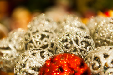 Many Red and White Christmas balls in rhinestones colorful Background