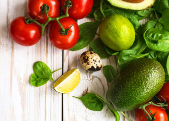 Spinach, lime, avocado, cherry tomatoes, quail eggs and apple