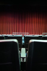 Movie Theatre Seating with Red Drapes