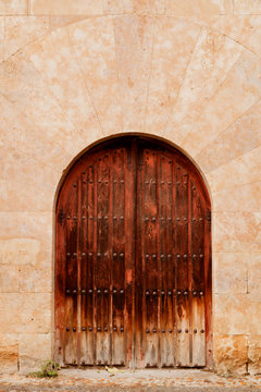 Old door with wrought iron decoration