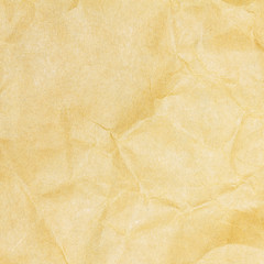 Recycled crumpled brown paper texture or paper background for design with copy space for text or image.