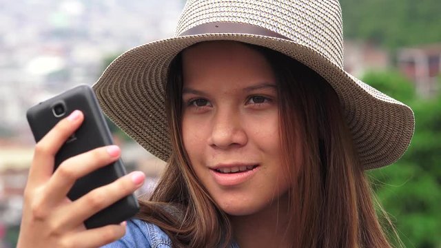 Pretty Teen Girl Taking Selfy