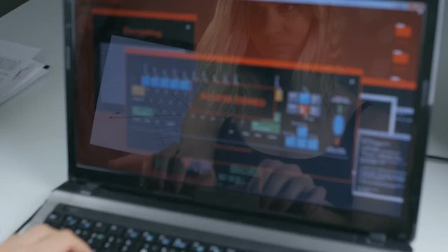 double exposure shot of woman hacker working at a laptop