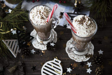 wait for Christmas drinking cocoa with whipped cream