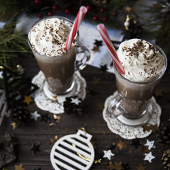 wait for Christmas drinking cocoa with whipped cream