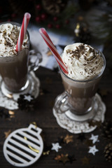 wait for Christmas drinking cocoa with whipped cream