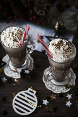 wait for Christmas drinking cocoa with whipped cream