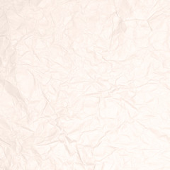 Recycled crumpled light brown paper texture or paper background for design with copy space for text or image.