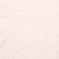 Recycled crumpled light brown paper texture or paper background for design with copy space for text or image.