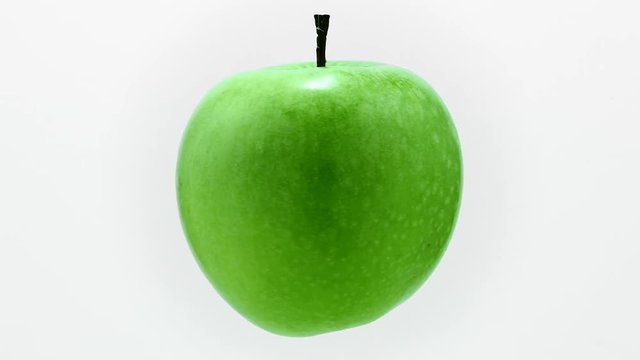 Green  apple rotates in loop 