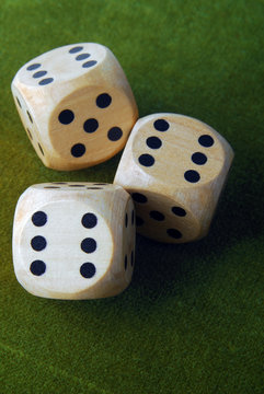 closeup of the dices on green table