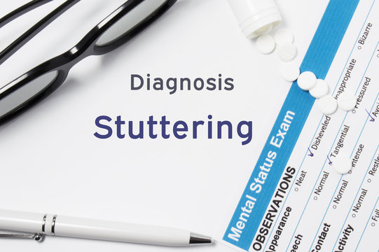 Diagnosis of Stuttering. Results of mental status exam, container with pills with inscription psychiatric diagnosis Stuttering on white background or white workplace psychiatrist or psychologist