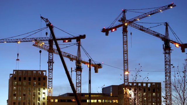 Cranes at construction site in Stockholm, Sweden