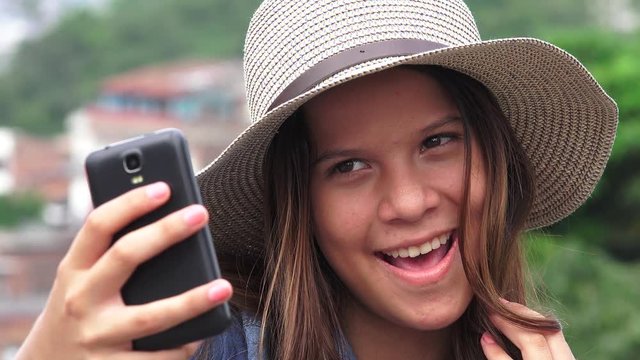 Adorable Teen Girl Making Selfies And Funny Faces