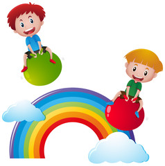 Two boys on balls over the rainbow