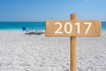 2017 concept in a beautiful beach
