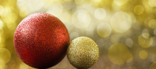 Website banner of golden and red Christmas decorations