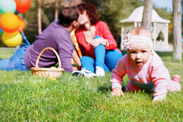 Fototapeta premium A happy family. Daughter's birthday one year.