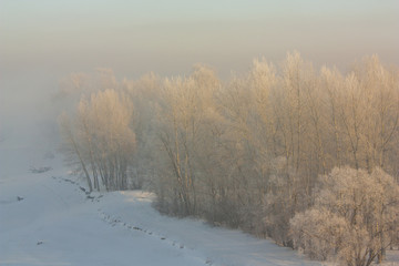 Frozen River in dawn sunlight.