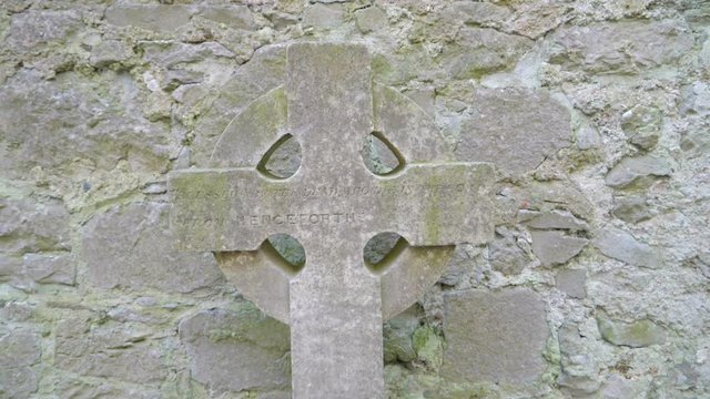 The high crosses on the gravestones with the cross sign on the stone in Ireland
