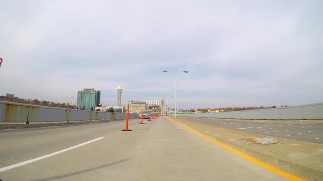 Motion video of a car driving from the US to Canada