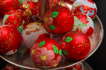 Fototapeta premium Beautiful red Christmas balls on the counter close-up