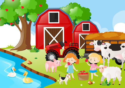 Two girls and farm animals by the river