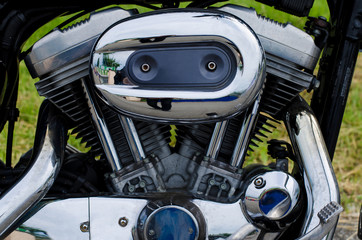 Fototapeta premium Glowing chrome motorcycle engine block