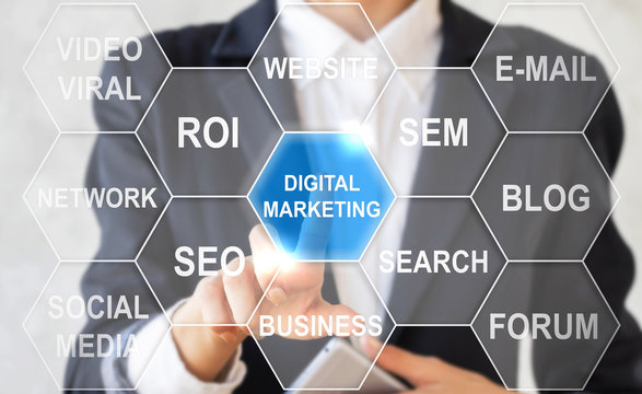 Businesswoman presses digital marketing hexagon button on virtual screen. Businessman touching icon digital marketing on touch screen. Internet concept, business, website.