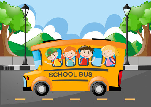 Children riding on school bus in morning
