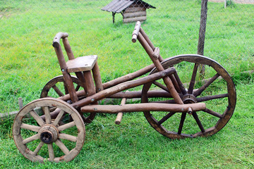 Three-wheeled wooden scooter
