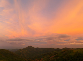 Pastel Purple and Orange Color of the Sunset Sky over Mountain Range in Thailand