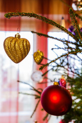 Christmas tree decorated with baubles.
