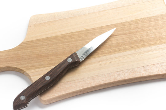Knife over a wooden board