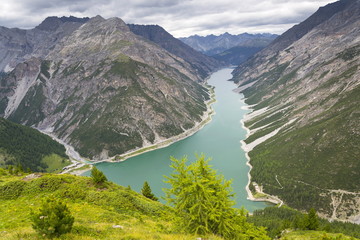 Aerial view of Livigno lake in Alps Mountains, Lombardy, Italy
