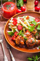 Chicken in tomato sauce with rice and green beans