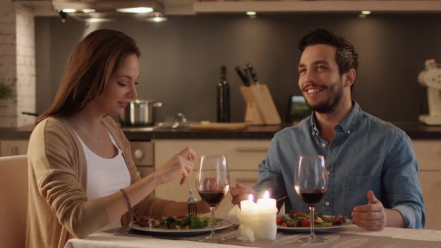  Beautiful Couple Having Candlelight Dinner in the Kitchen
