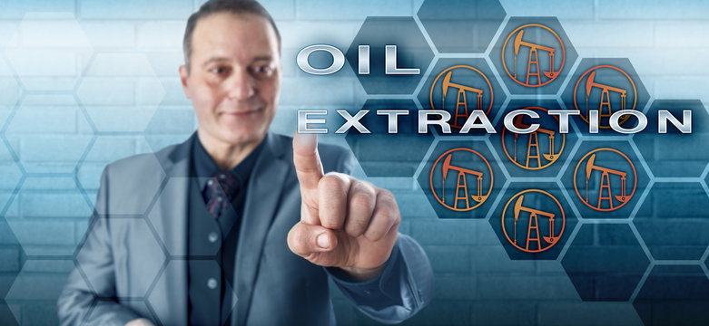 Smiling Businessman Activating OIL EXTRACTION