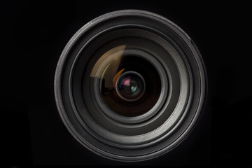 Camera lens close-up on black background - obrazy, fototapety, plakaty