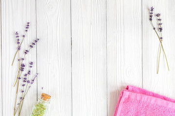 Natural organic cosmetics for baby with lavender on wooden background