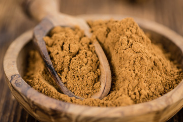 Wooden table with Cinnamon (selective focus)