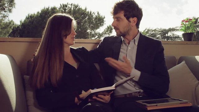 Business woman avoiding harassment from partner