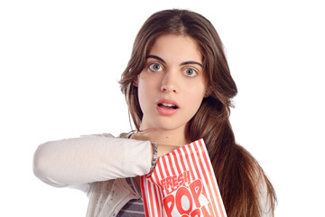 Young woman eating popcorn