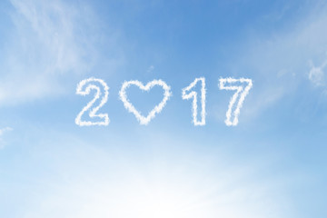 Naklejka na ściany i meble 2017 cloud with heart shape on blue sunshine sky