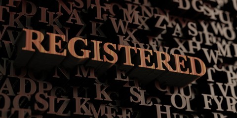 Registered - Wooden 3D rendered letters/message.  Can be used for an online banner ad or a print postcard.