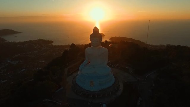 Aerial: Beautiful sunset at Big Buddha.