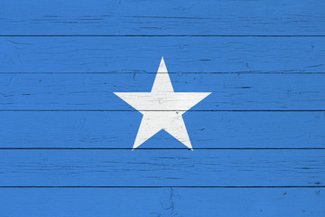 Fototapeta na wymiar Flag of Somalia on wooden background