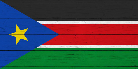 Flag of South Sudan on wooden background