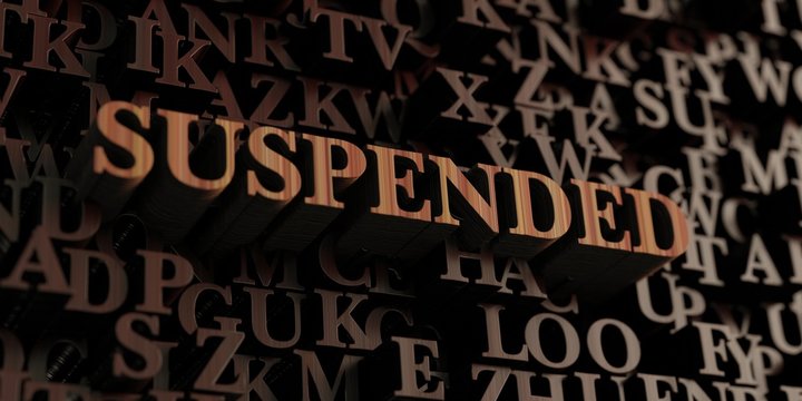 Suspended - Wooden 3D rendered letters/message.  Can be used for an online banner ad or a print postcard.